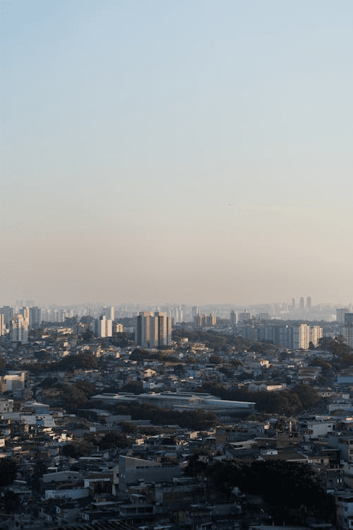 A mid-sized American city skyline with residential and mixed-use buildings