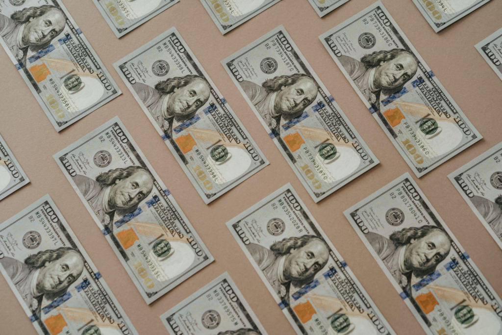 United States dollar bills arranged in rows