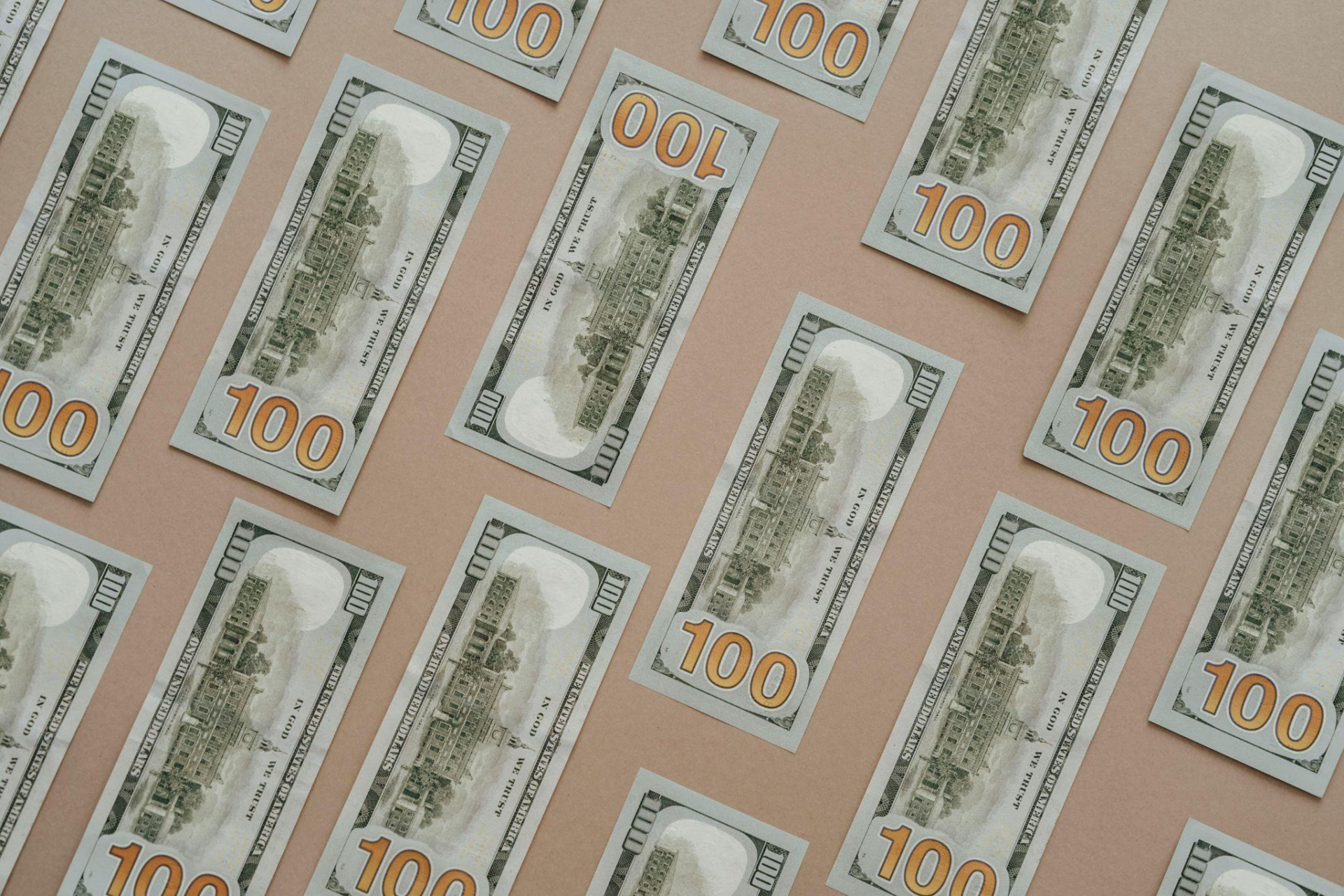 US dollar bills arranged in a pattern