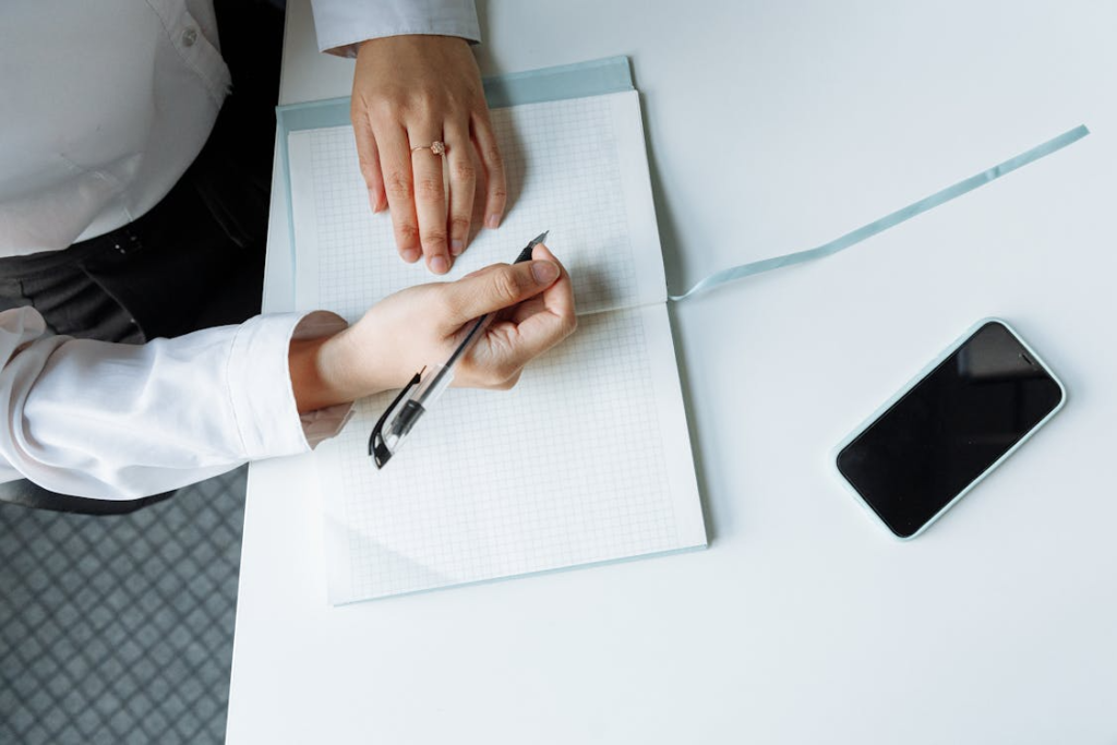 An image of a person looking at some documents  