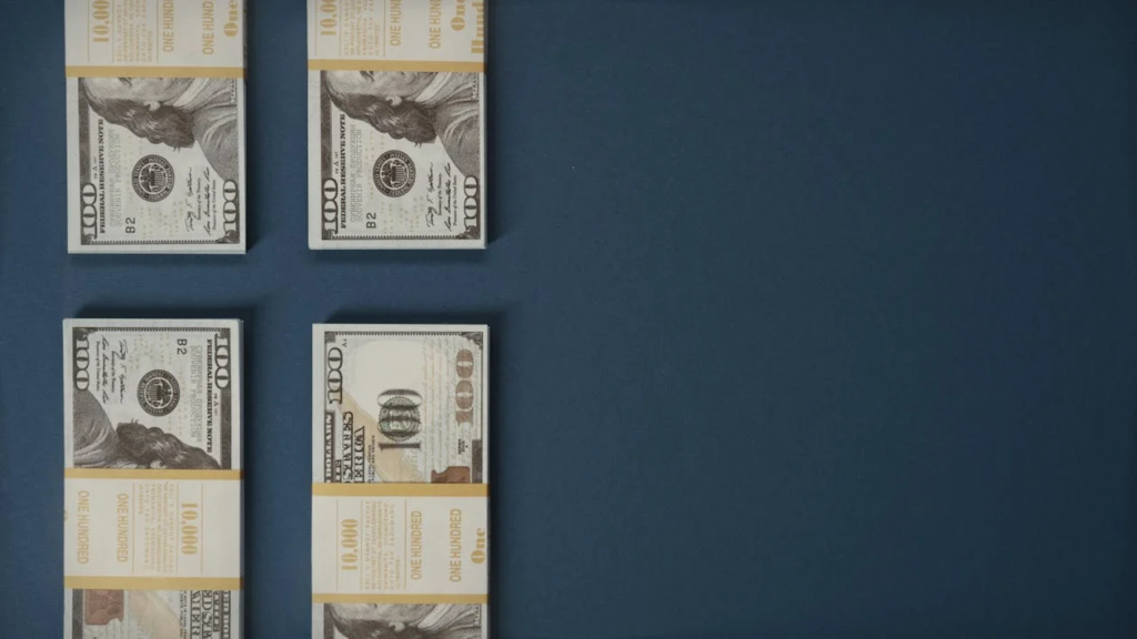 Stacks of US currency symbolizing fast bridge capital for real estate acquisitions
