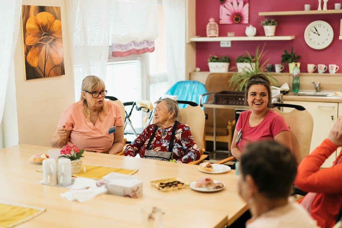 Seniors sitting around a table