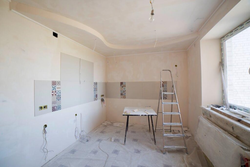 a modern interior of a kitchen under renovation