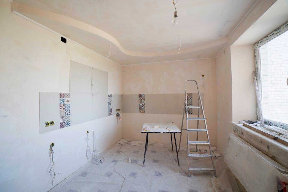 a modern interior of a kitchen under renovation