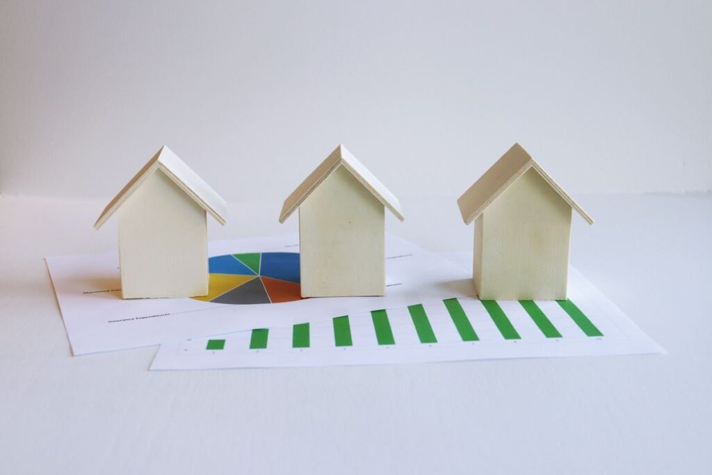 Model houses on rising financial charts